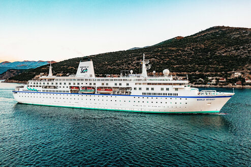 MV World Odyssey sailing into port